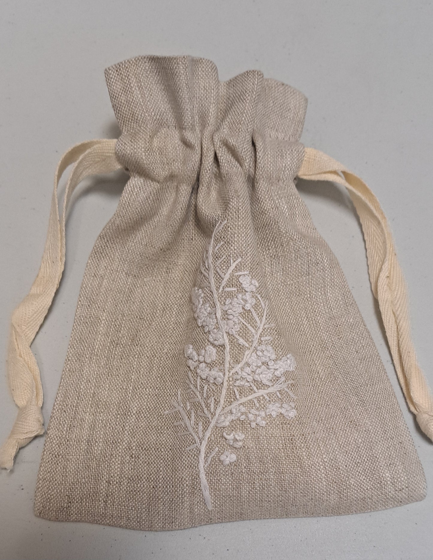 "Botanicals" Small Drawstring Pouch, hand embroidered linen ~5” x 6”